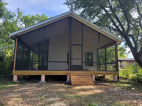 patio screen enclosure in a wooded area in austin